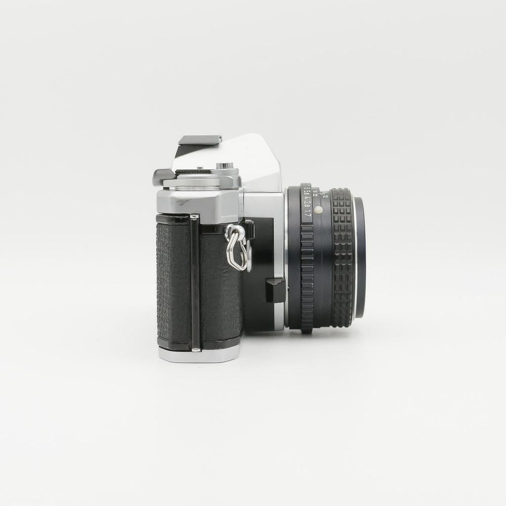 Pentax MX silver with SMC 50mm f1.7 side view