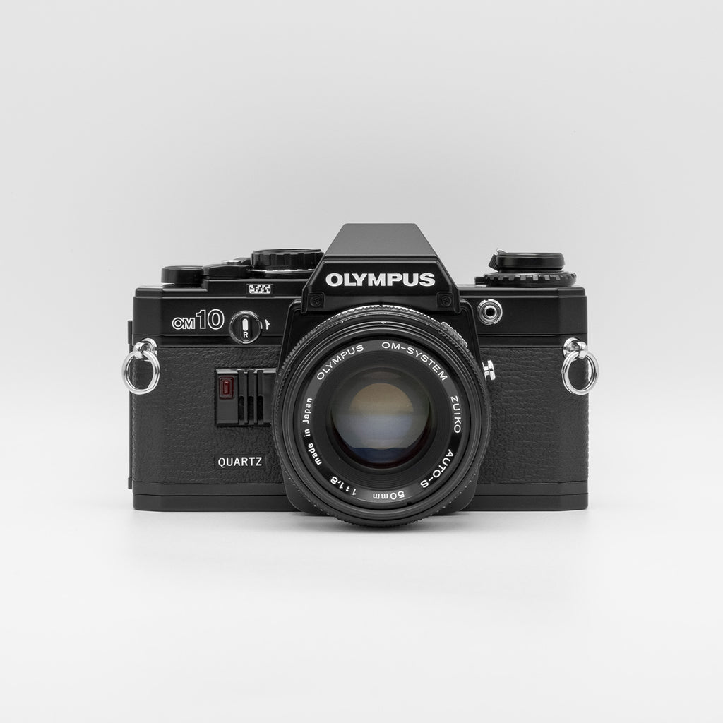 Olympus OM10 Quartz black with Zuiko 50mm f1.8 front view