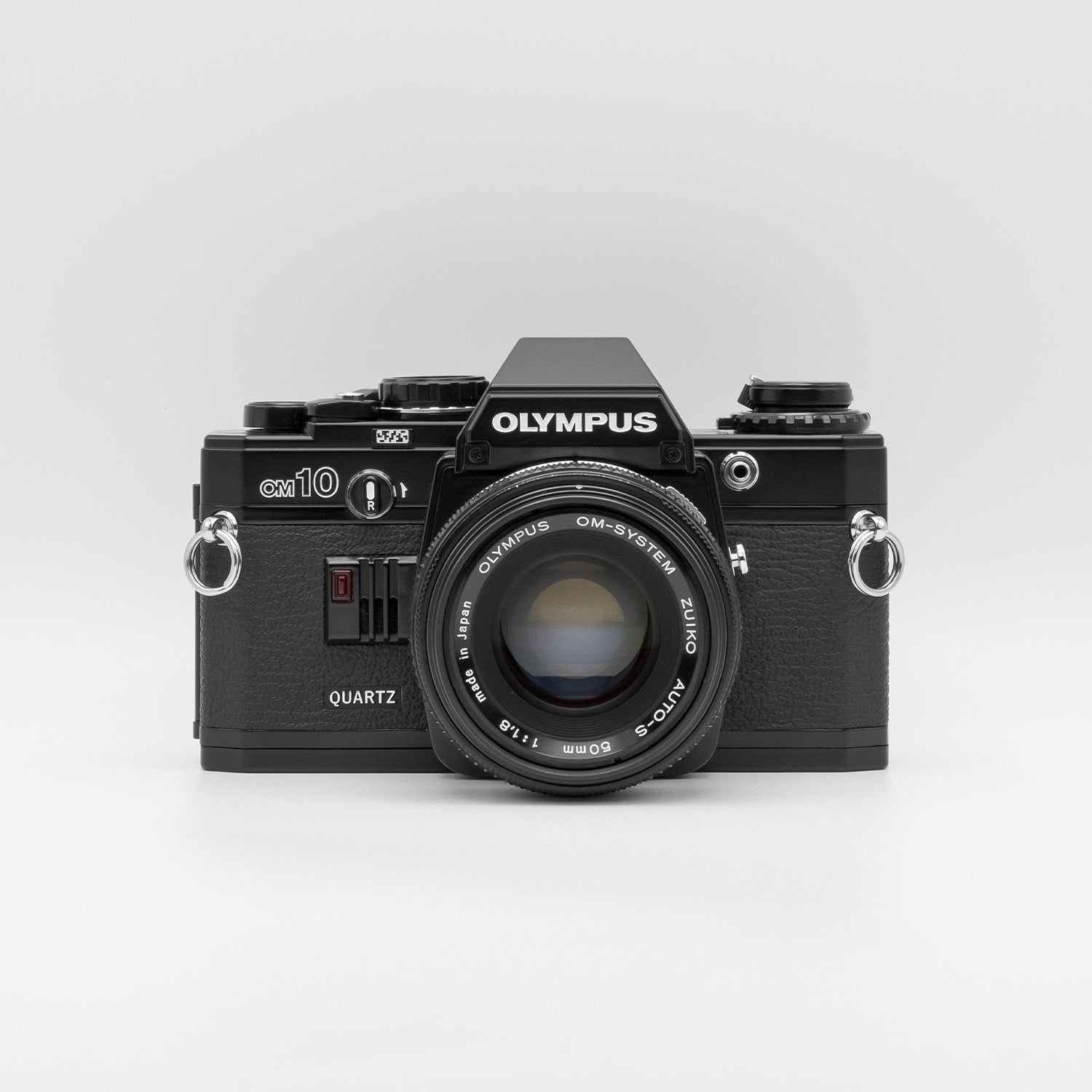 Olympus OM10 Quartz black with Zuiko 50mm f1.8 front view