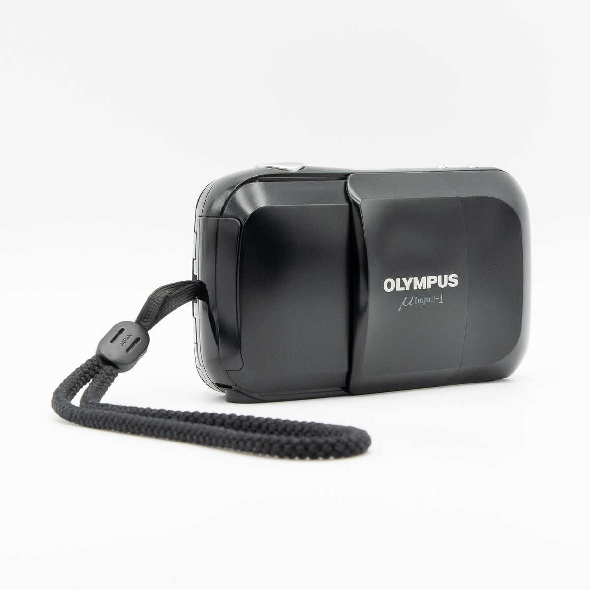 Olympus Mju I with its original wrist strap